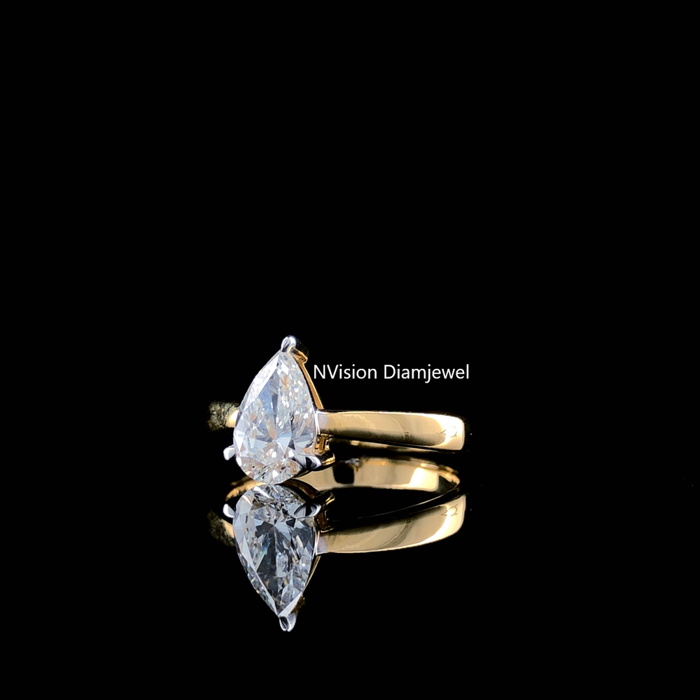 The Dripping Iconic Pear Natural Solitaire Ring