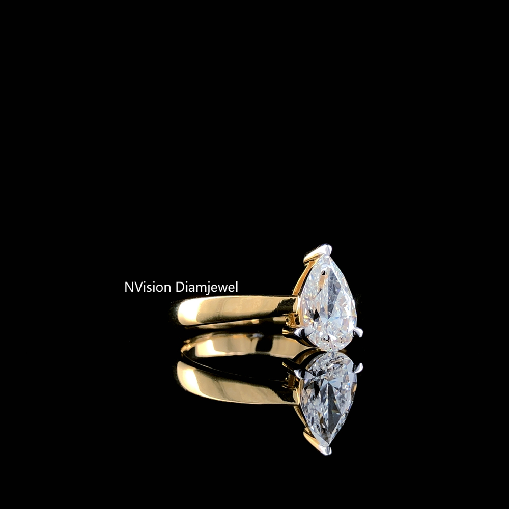 The Dripping Iconic Pear Natural Solitaire Ring