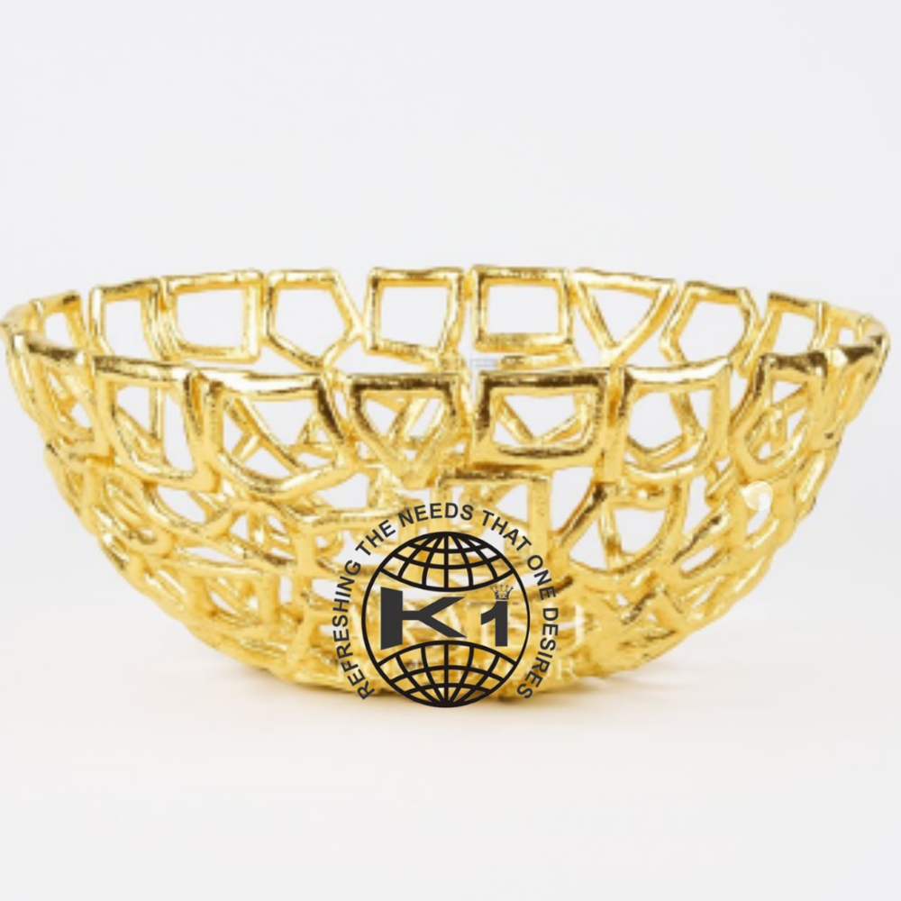 gold-colored metal decorative bowl.