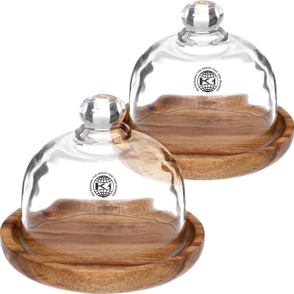 mini glass dessert domes with wooden bases. 