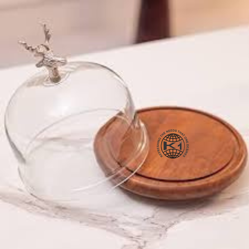 mini glass dessert domes with wooden bases. 