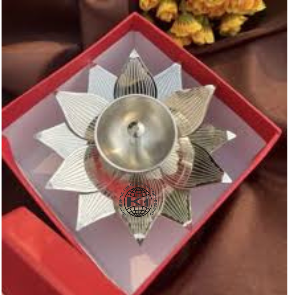 silver coated lotus style diya