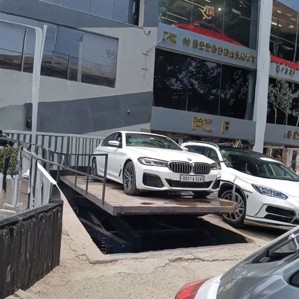 HYDRAULIC SCISSOR LIFT HYDRAULIC SCISSOR LIFT