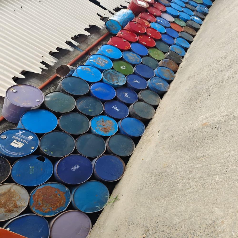 EMPTY PLASTIC AND TIN BARRELS