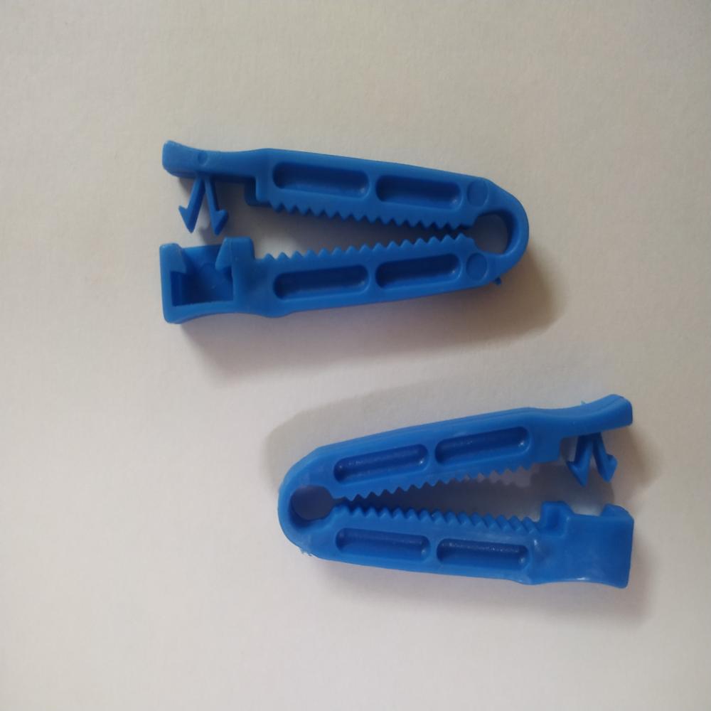 Cord Clamp - Material: Plastic