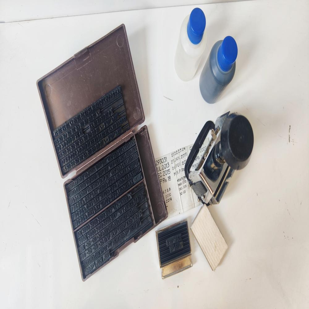 Hand-operated batch coding machine