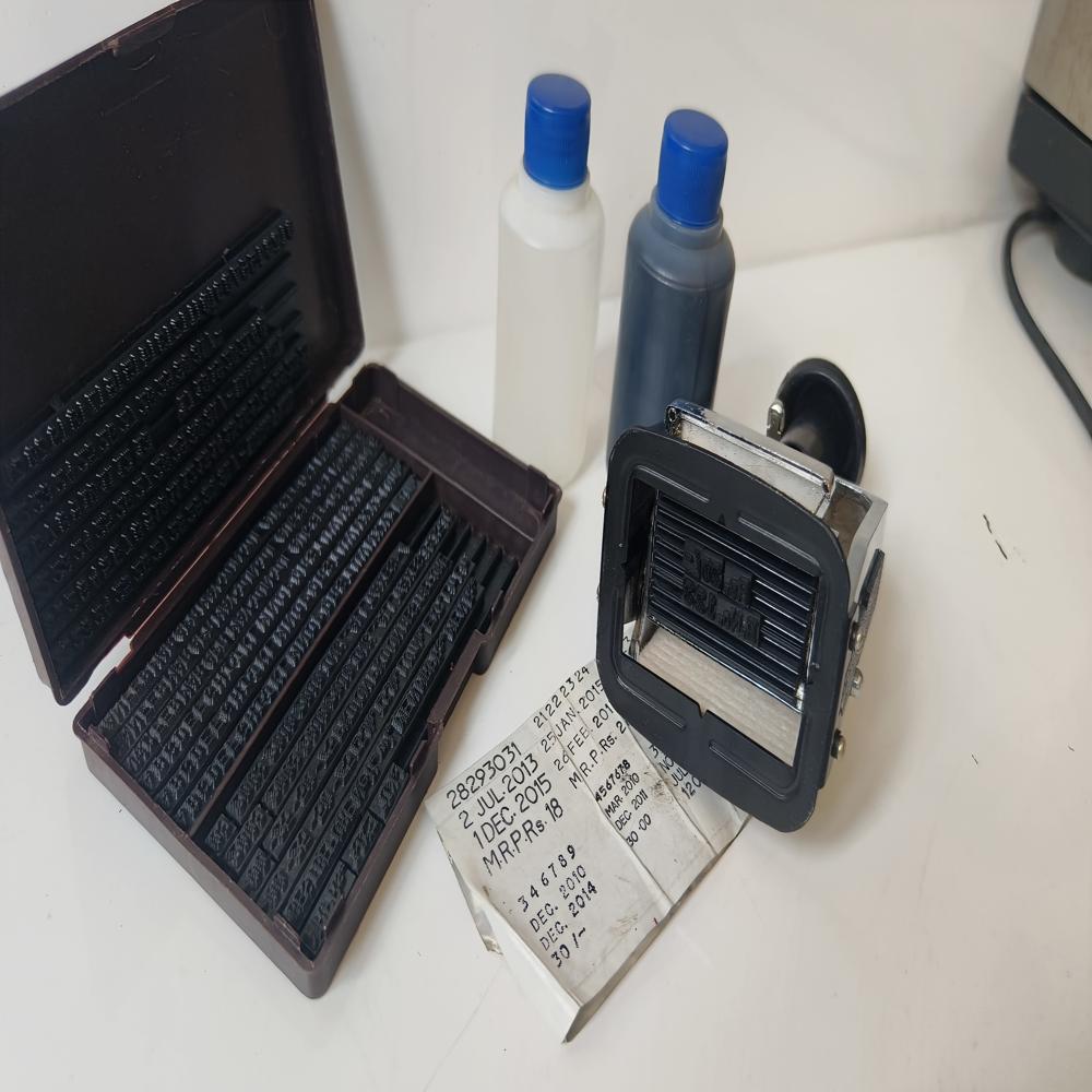 Hand-operated batch coding machine