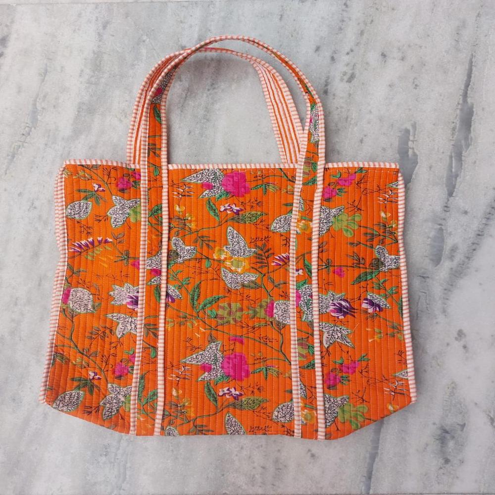 Orange floral Printed Quilted Bag with concealed zip