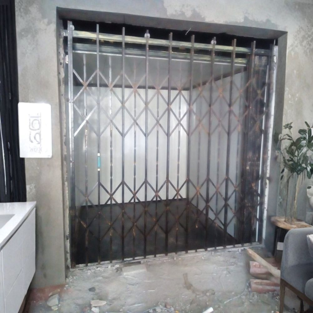 Rachna Elevator Goods Lift - Stainless Steel, Yellow, 5m Height, 5 Long Ton Capacity | Electric, Emergency Stop, Over Speed Protection