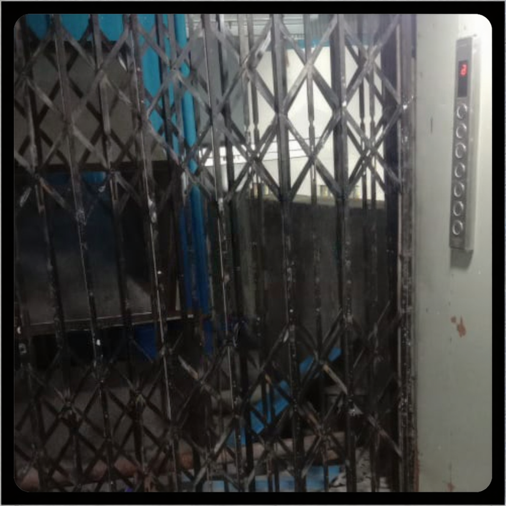 FREIGHT COM PASSENGER ELEVATOR