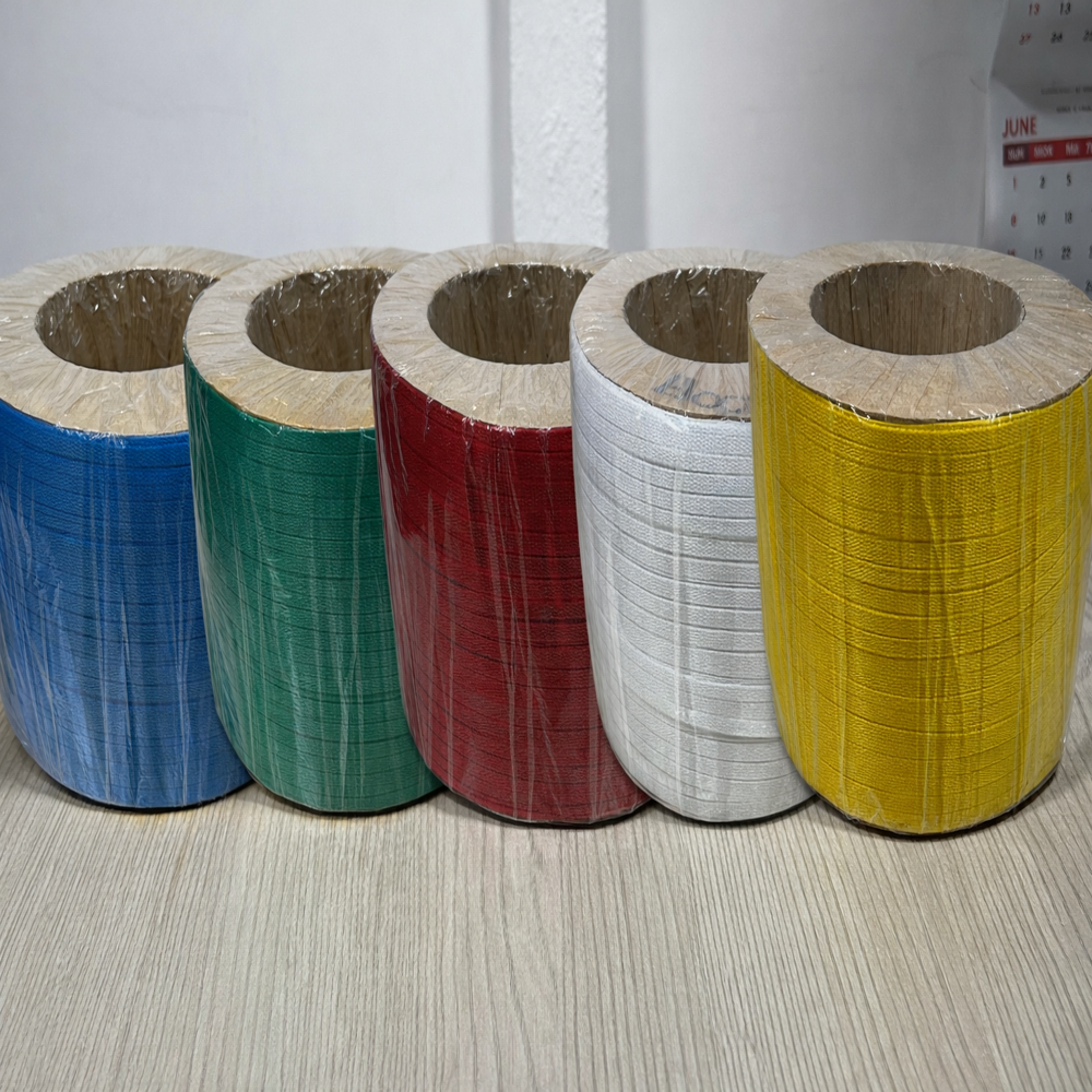 Multi-Color Strapping Roll Next To Virgin Patti
