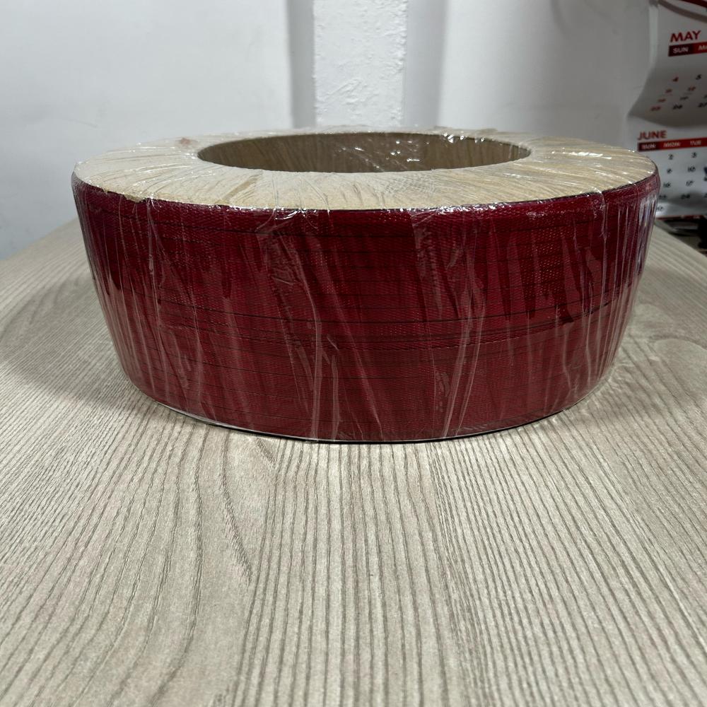 Multi-Color Strapping Roll Next To Virgin Patti