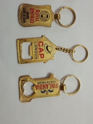 Golden bottle opener key