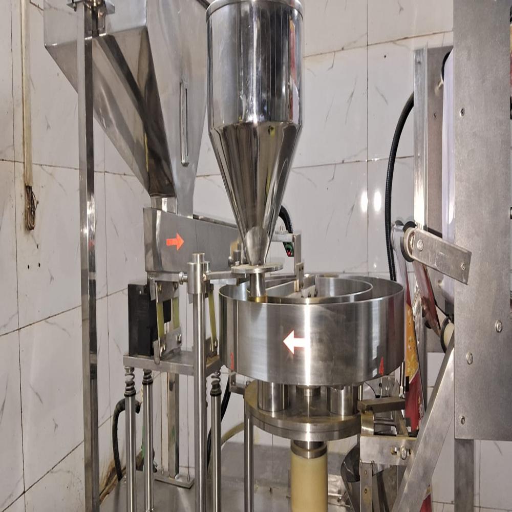 AUTOMATIC CUP FILLER BELT DRAW