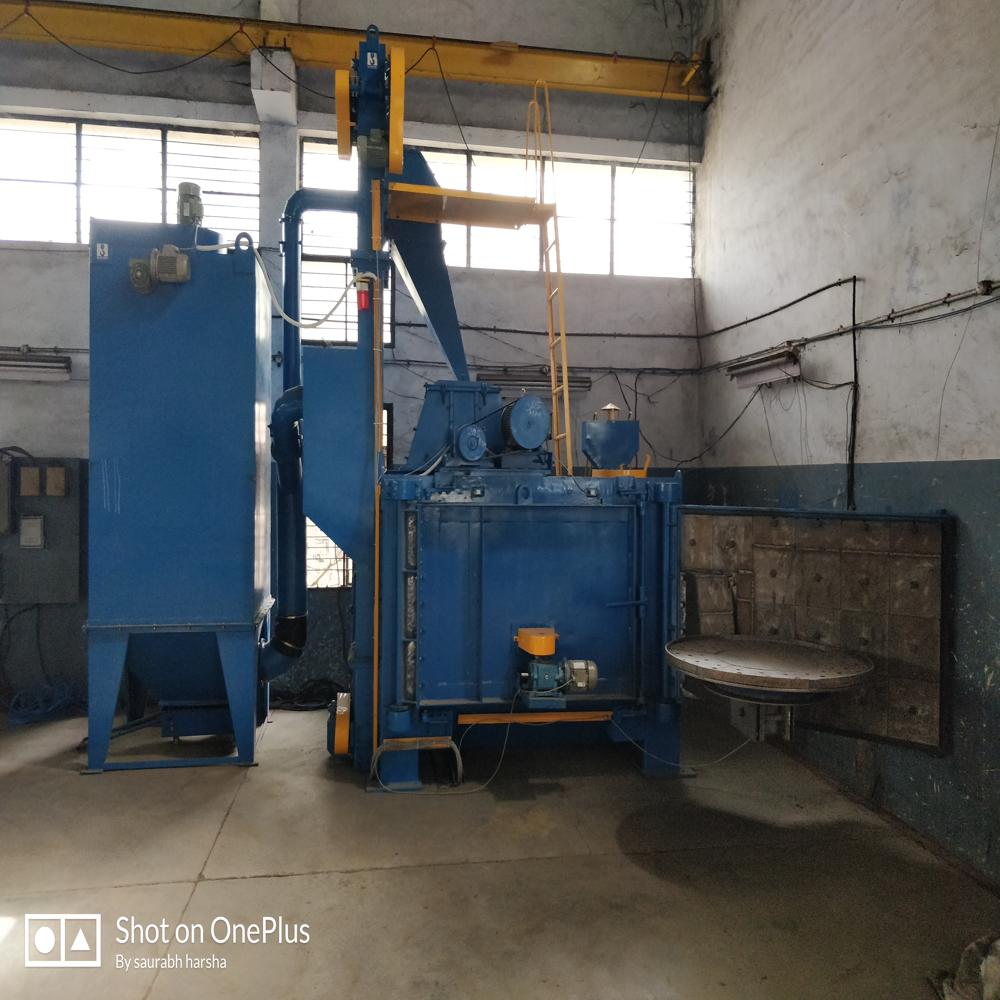 1200 Turn Table Shot Blasting Machine - 12.5" Wheel Size, 5-10 Ton Capacity | Automatic Operation, Durable Dark Blue Finish, Robust Dust Collector, Ideal For Castings And Forgings