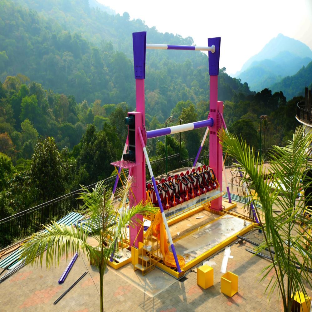 Amusement Park Top Spin And Tsunami Ride