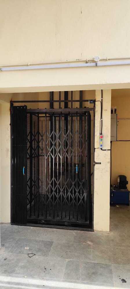 Dual Mast Goods Lift - Stainless Steel, 4-5 Ton Capacity, 30 Feet Height | Energy Efficient, Overloading Alarm, User-friendly Mechanism, 24 Months Warranty