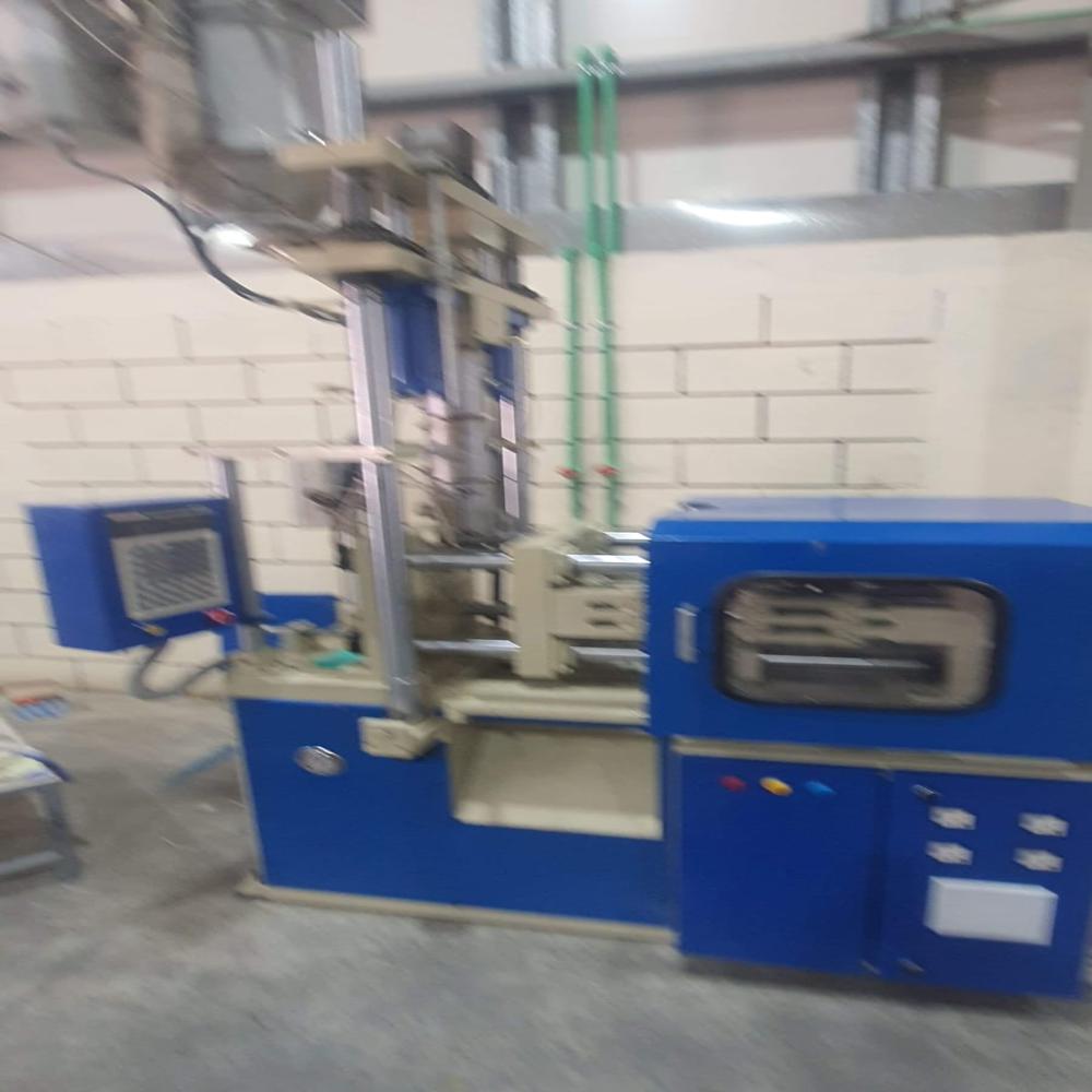 Blue-white Fully Automatic Toggle Type Vertical Injection Moulding Machine