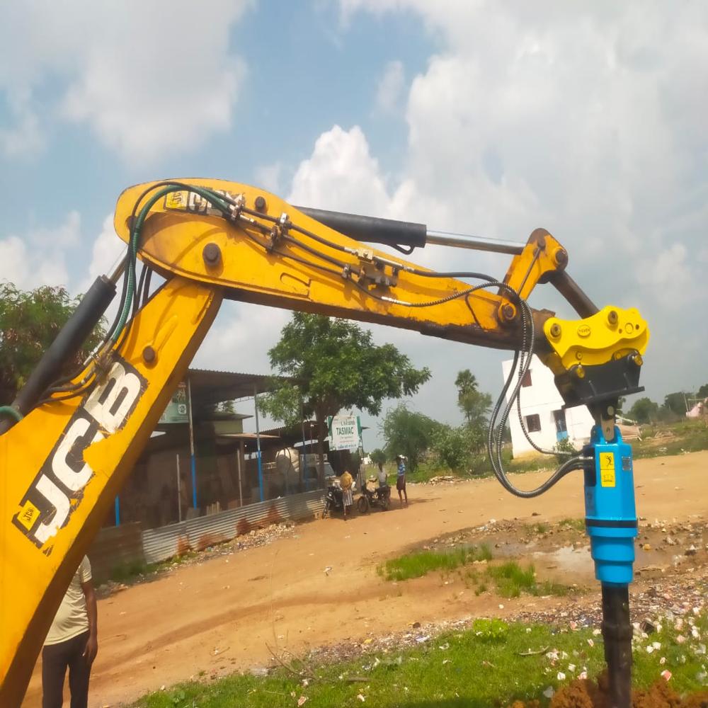 Backhoe Loader Mounted Earth Drilling Auger - Color: Yellow
