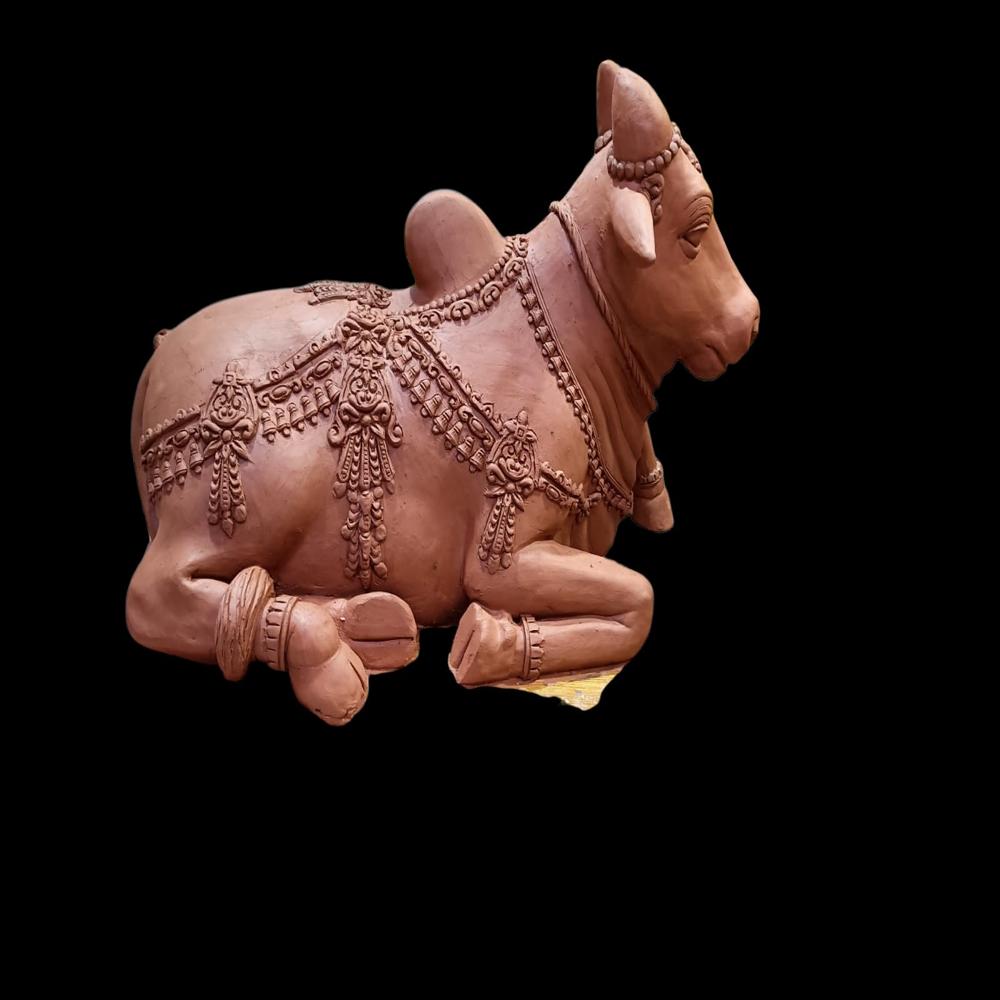 FRP Bull sitting sculpture