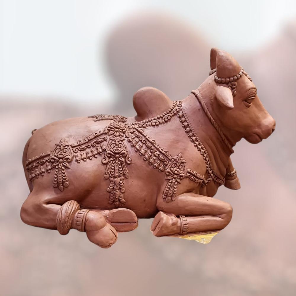 FRP Bull sitting sculpture