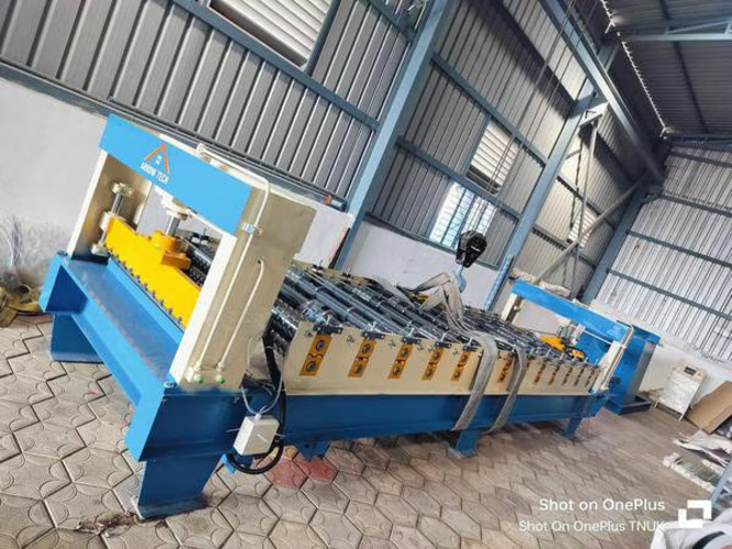 Roofing sheet forming machine