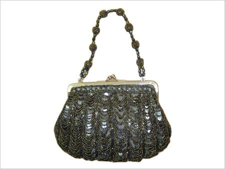 मोती वाला फ्रेम बैग