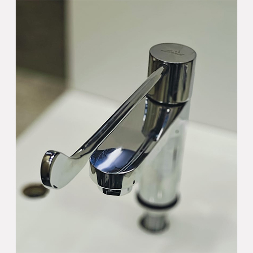 Elbow operated pillar cock