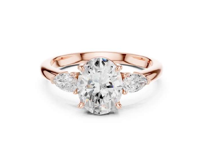 Rose Gold Oval and Pear Three-Stone Diamond Ring