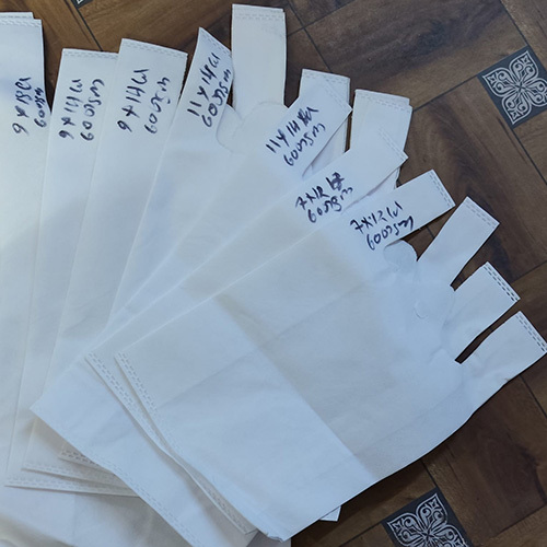 9x18 - 9x14 - 11x14 - 7x12 W Cut Loop Menual Printed Non Woven Bag