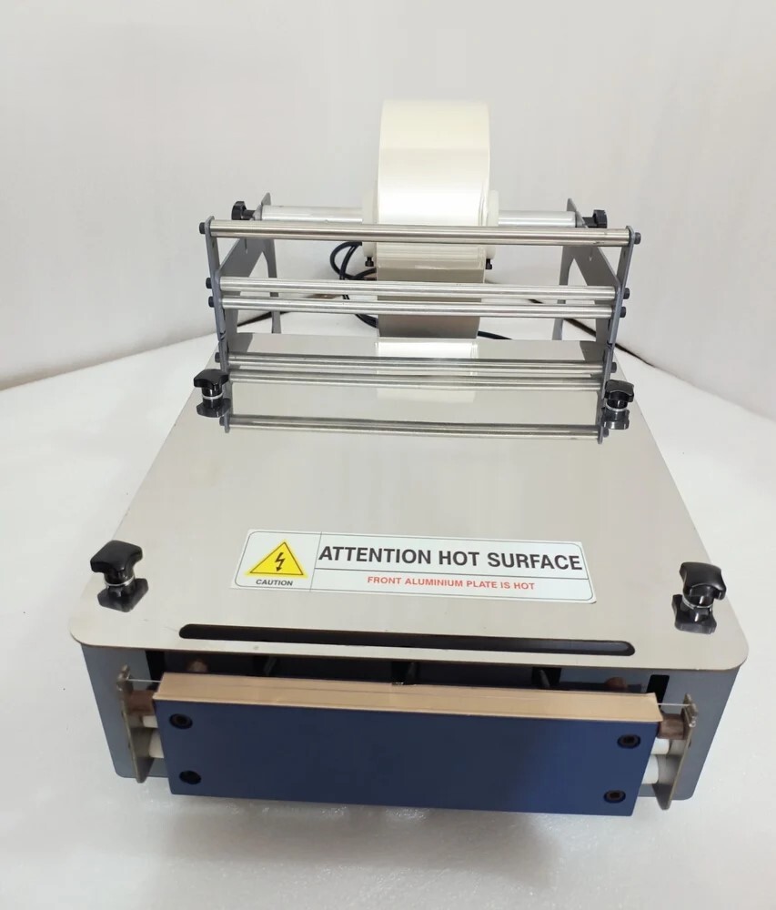 Manual Overwrapping machine Pre-Cut Film with Dot Sealer