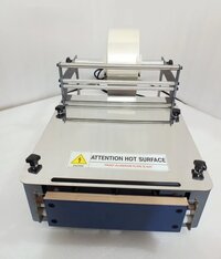 Manual Overwrapping Machine Pre-cut Film With Dot Sealer