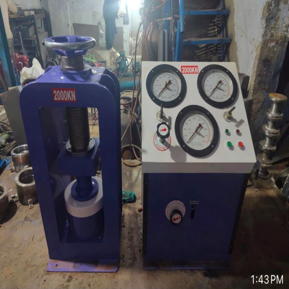 Compression Testing Machine Electrical Cum Hand Operated - Welded Steel Frame 85x55x112 Cm, Blue & White, 100 Ton Capacity, Digital Display, Hand Pump Included