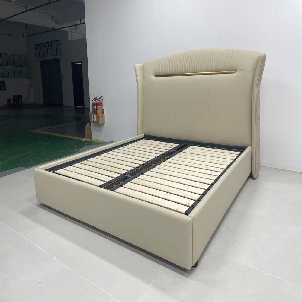 Elegant Beige Leather King Size Bed with Wingback Headboard