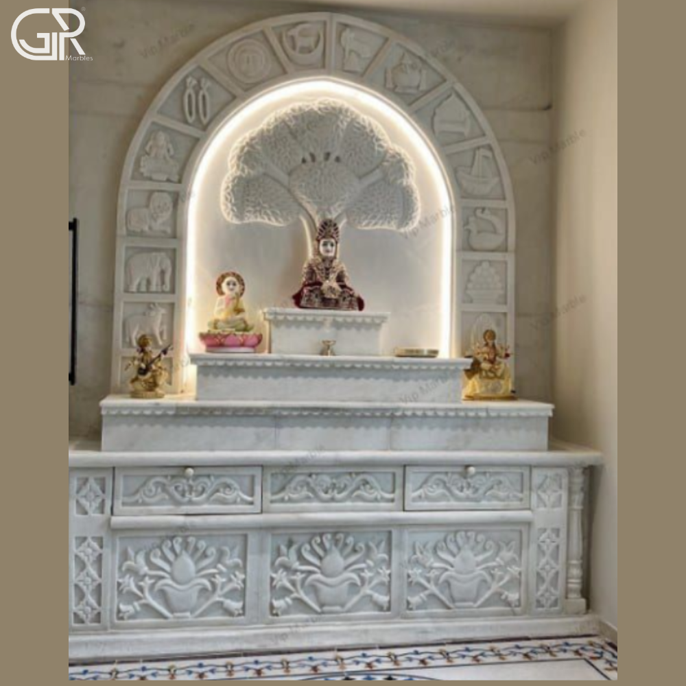 Carved marble mandir with Ganesha statue