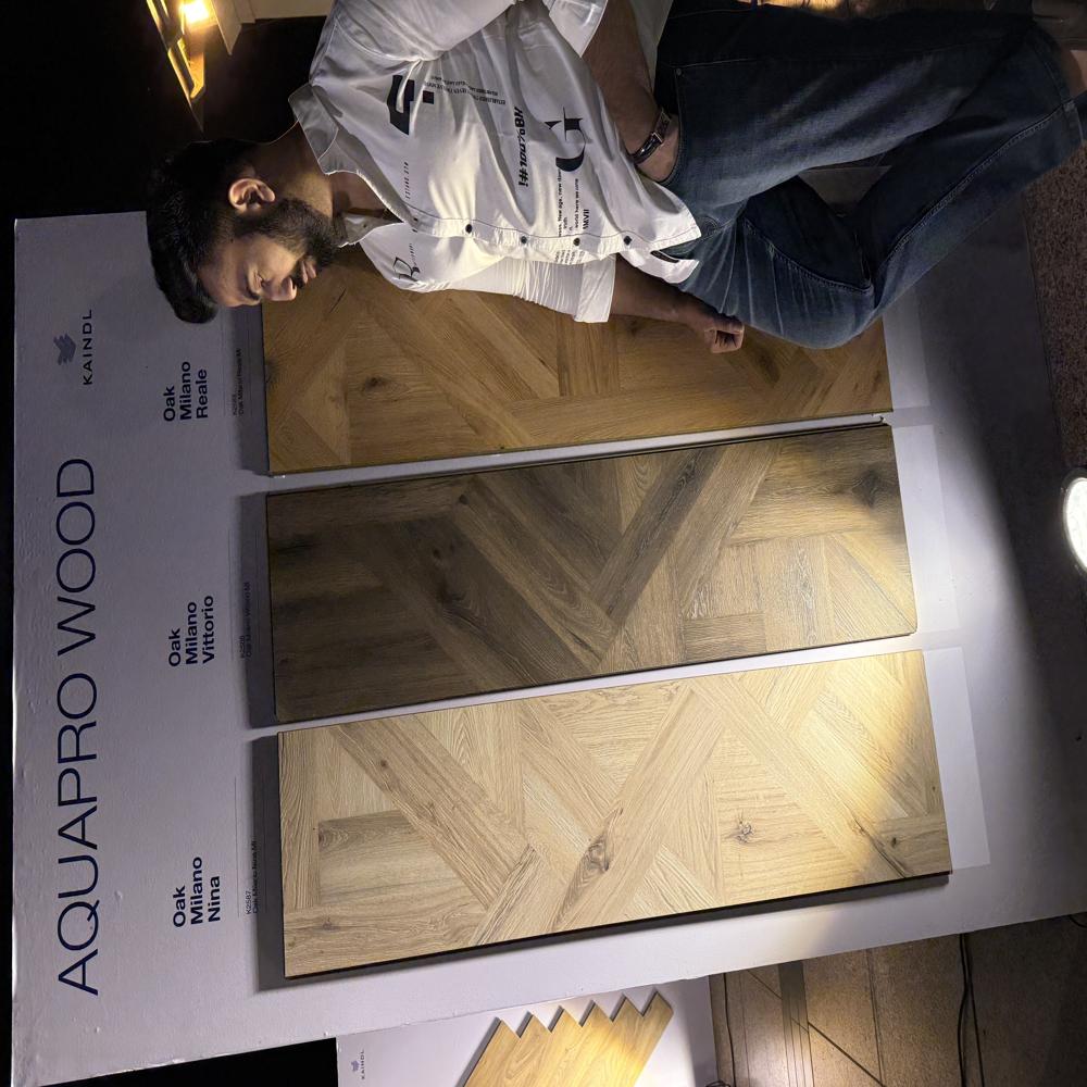 Kaindl Aqua Pro waterproof laminate flooring supplier India Premium oak finish laminate flooring for home and office Herringbone laminate flooring design for luxury interiors Best European laminate flooring brand in India