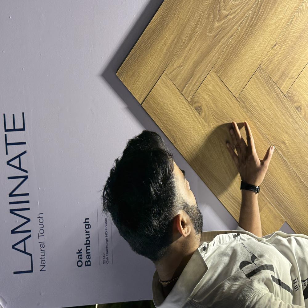 Kaindl Aqua Pro waterproof laminate flooring supplier India Premium oak finish laminate flooring for home and office Herringbone laminate flooring design for luxury interiors Best European laminate flooring brand in India