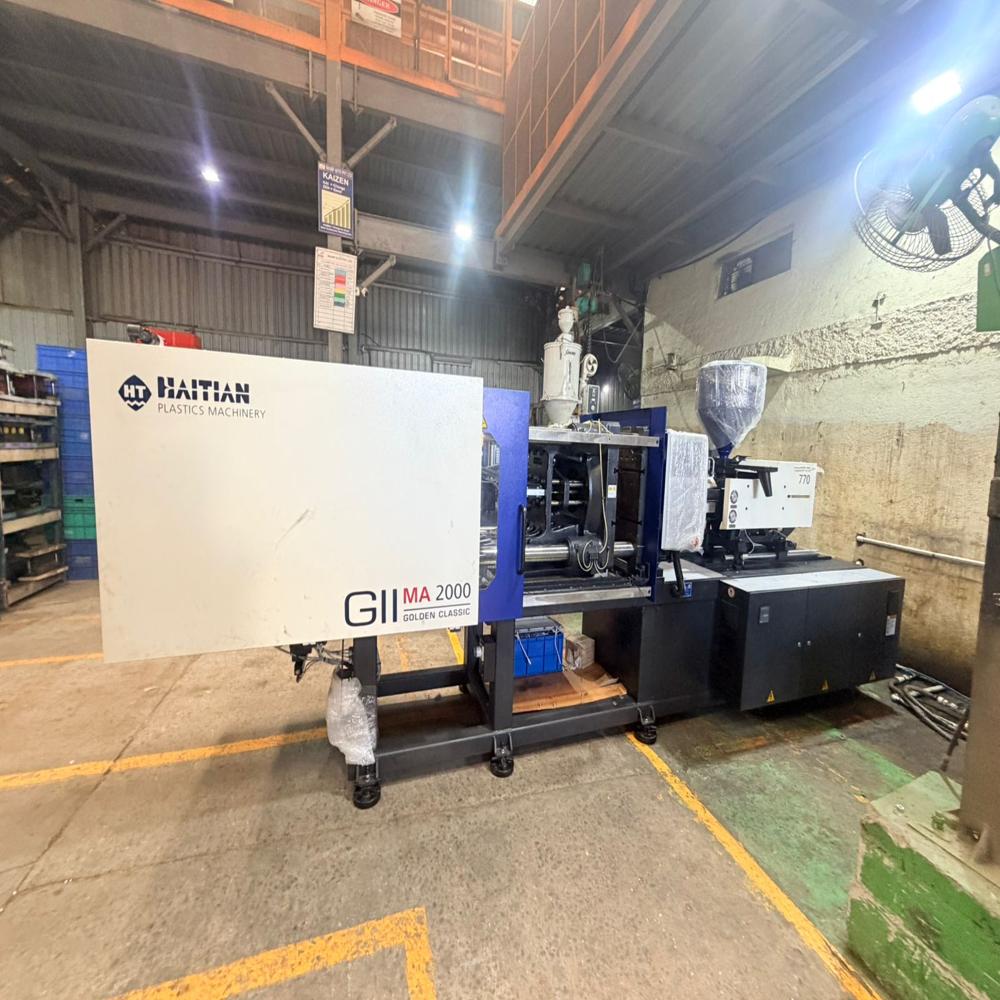 Used Plastic Moulding Machines Brand Haitain  200 Ton  Price 15 Lakh