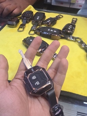 Luxury Waterproof Transformer Metal Car Key Cover with Keychain & Full Protection 2 Button for Suzuki Swift, Dzire, WagonR, Brezza, Fronx, XL6, Ignis, Ertiga, Baleno, Celerio, Alto