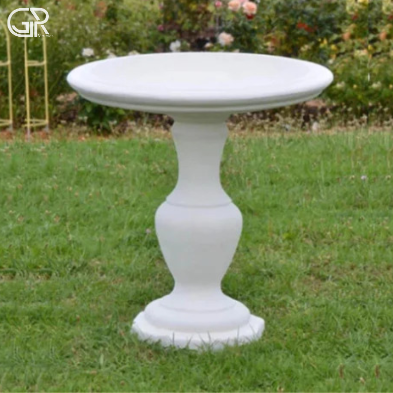 white marble birdbath