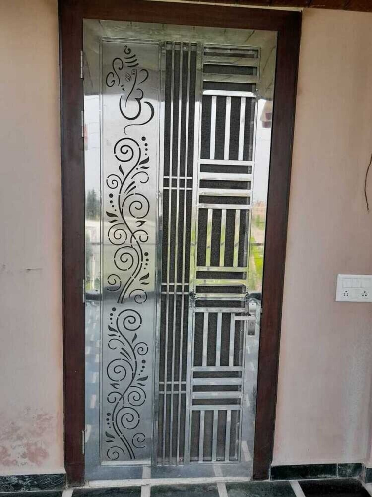 Stainless Steel Main Door - Design: Modern With Vertical And Geometric Patterns