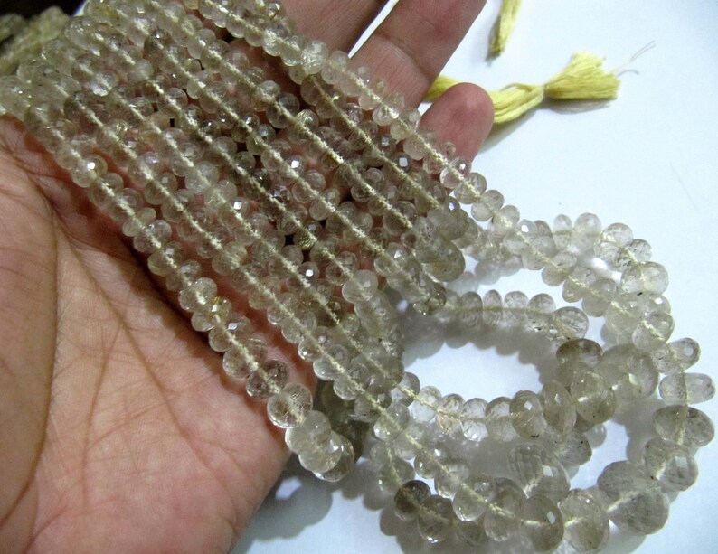 Natural Golden Rutilated Quartz Rondelle Faceted 6 to 10 Graduated Beads sold per strand 8 Inch Long