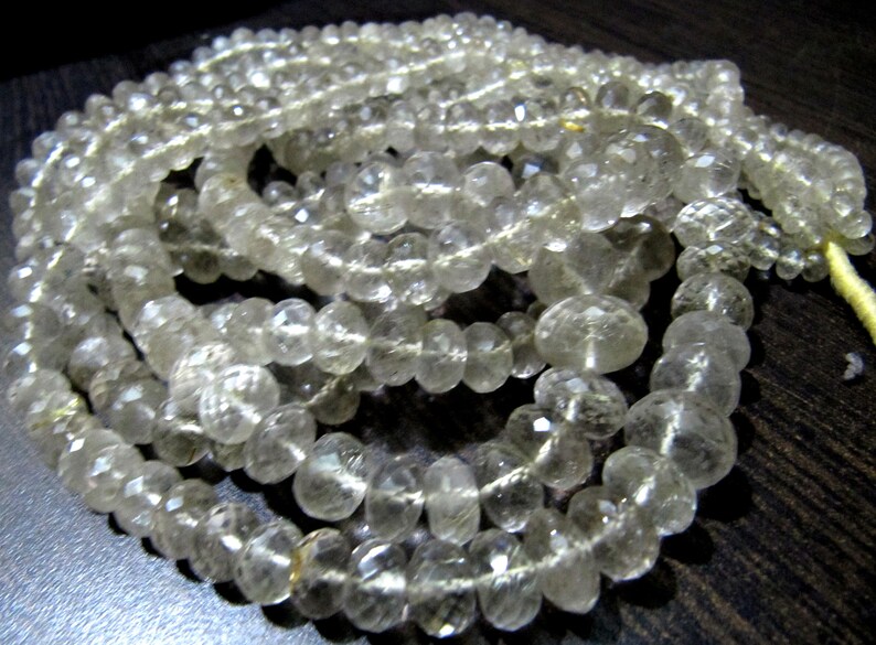 Natural Golden Rutilated Quartz Rondelle Faceted 6 to 10 Graduated Beads sold per strand 8 Inch Long