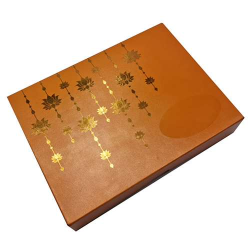 12 Cavity Premade Chocolate Box With Golden Embossed Lotus Hanging Designs In Pearl Deep Saffron