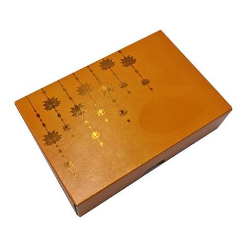 6 Cavity Premade Chocolate Box With Golden Embossed Lotus Hanging Designs In Pearl Deep Saffron