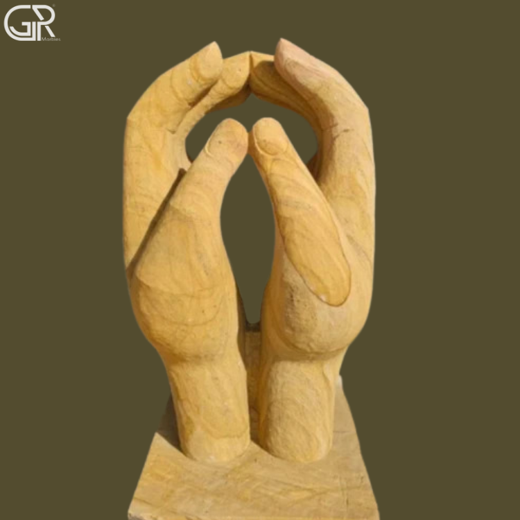 sandstone hand sculpture