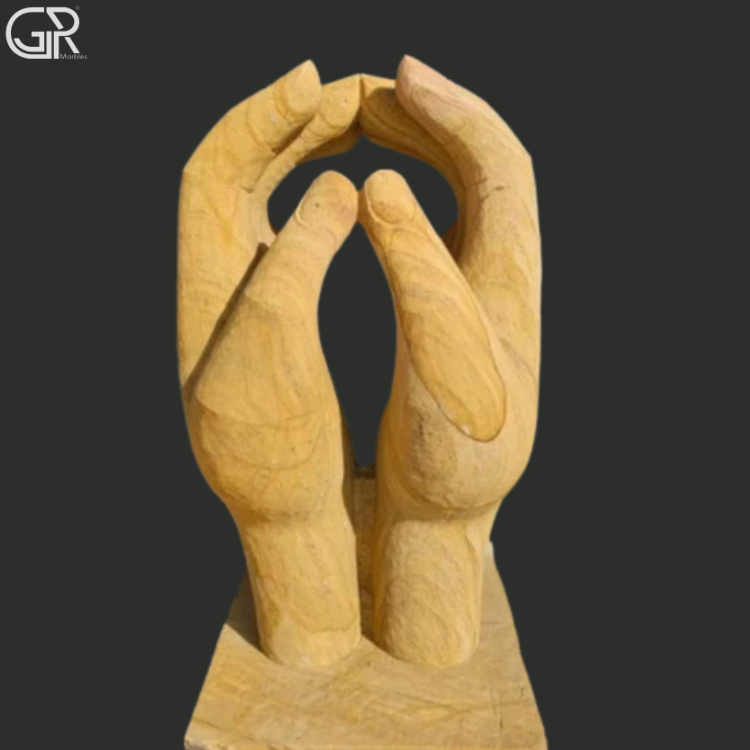sandstone hand sculpture