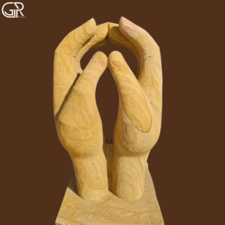 sandstone hand sculpture