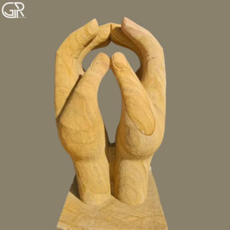 sandstone hand sculpture