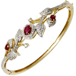 लीफ स्टाइल रूबी और डायमंड स्टडेड गोल्ड ब्रेसलेट